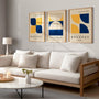 navy yellow and beige bauhaus poster set arranged as modern gallery wall