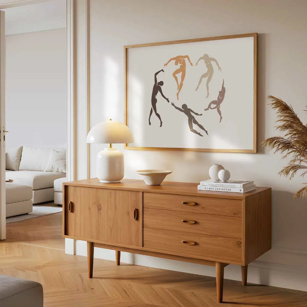 framed posters and canvas wall art above cabinet in modern living room with neutral minimalist interior