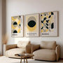 yellow geometric bauhaus poster set in contemporary office workspace
